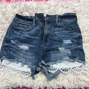 Darker washed jean shorts size in between 00 and 0
